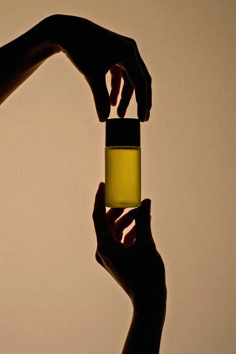 Hands holding a product bottle